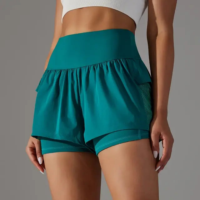 Anneloes | Hoge Taille Workout Shorts met Ritszakken - Luxe Nova Groen / XS Luxe Nova broek